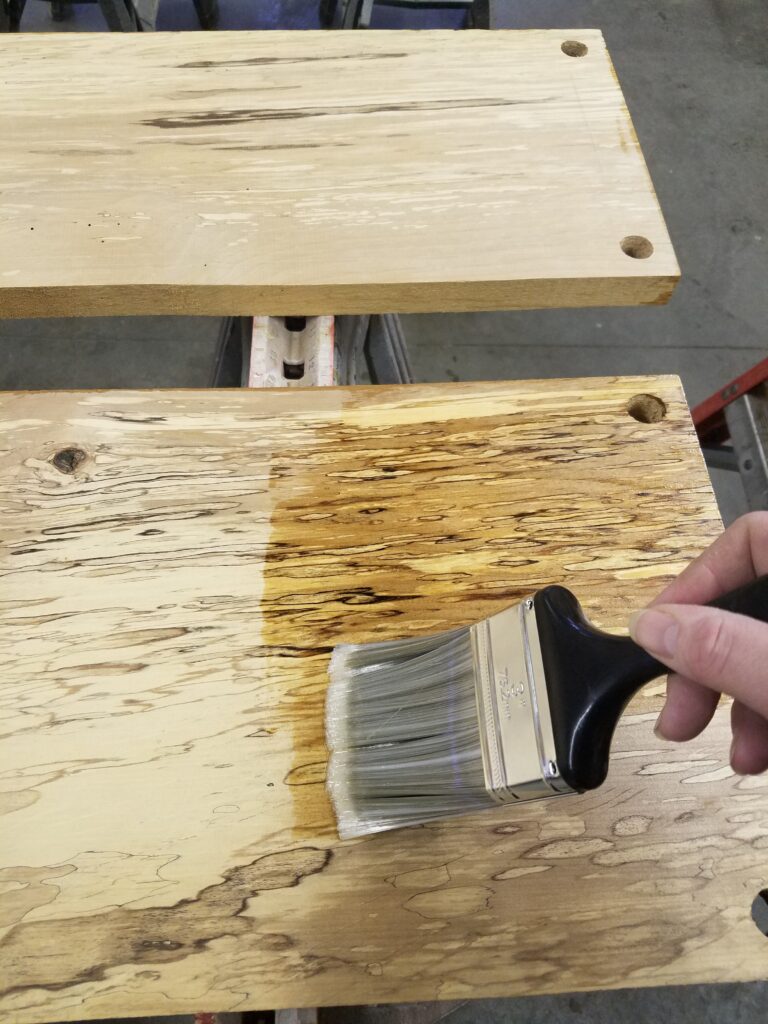 applying the first coat of poly